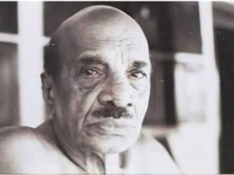 Vaikom Muhammad Basheer with his mustache wearing nothing on top