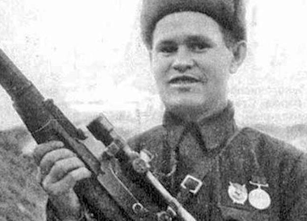 Vasily Zaytsev a legendary Russian sniper holding a sniper gun