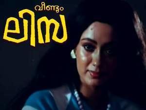 Shari with a tight-lipped smile in a movie scene from Veendum Lisa, a 1987 Malayalam horror film, has a long hair, wearing earrings, a necklace, and a blue silk top