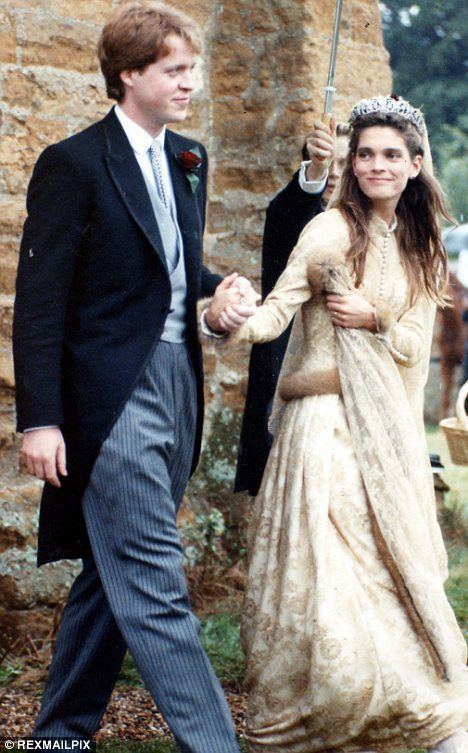 Victoria Aitken wearing a gown and Charles Spencer wearing a suit on their wedding day.