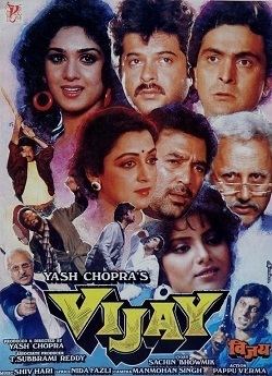 The movie poster of the 1988 Bollywood film Vijay featuring all of the cast.