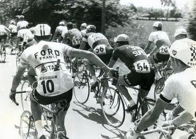 Vin Denson Vin Denson shares beers with his teammates during Tour de France