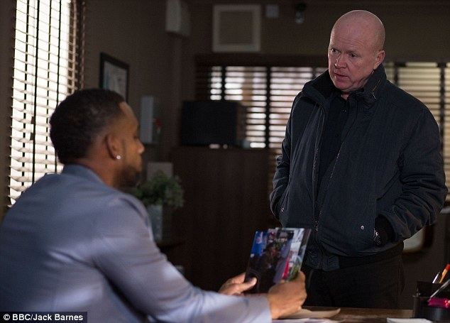 Vincent Hubbard EastEnders39 Phil Mitchell is punched by Vincent Hubbard during tense