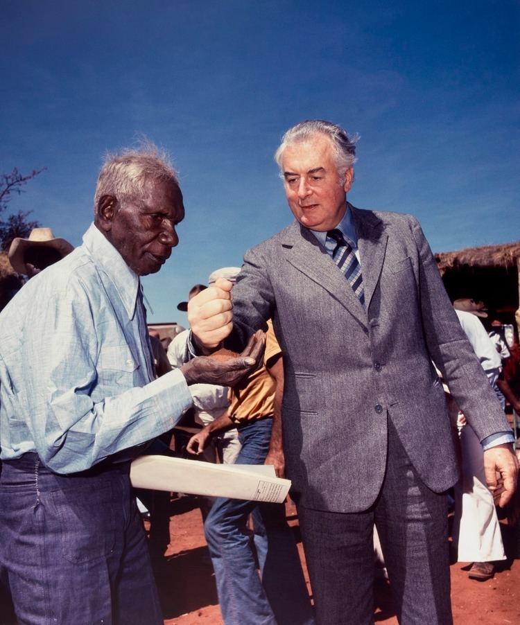 Vincent Lingiari Prime Minister Gough Whitlam pours soil into the hand of