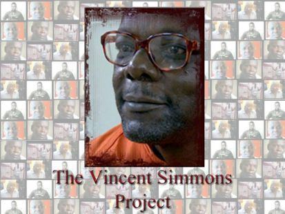 Vincent Simmons, smiling while looking afar, was a life prisoner at Angola State Prison in Louisiana, where he was sentenced to 100 years in July 1977. In the background are a collage of people and wordings in front saying "The Vincent Simmons Project". He has a mustache and a beard, wearing brown eyeglasses and an orange collared prison uniform.