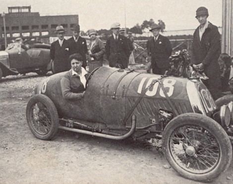 Violette Morris riding on the sur cycle-car