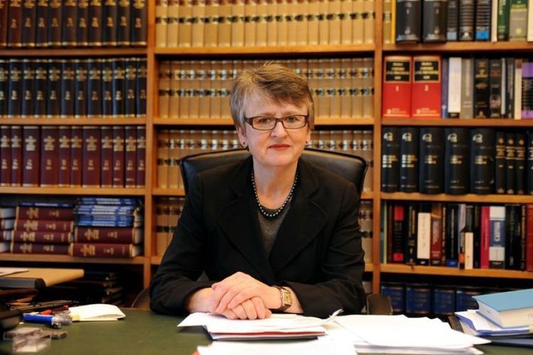 Justice Virginia Bell poses for photographs in her office at the NSW Supreme Court