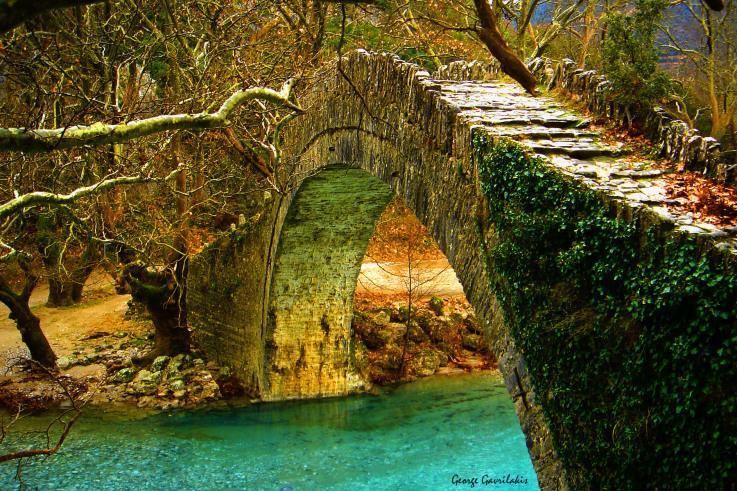 Voidomatis Voidomatis river and stone bridge by George Gavrilakis Pixdaus