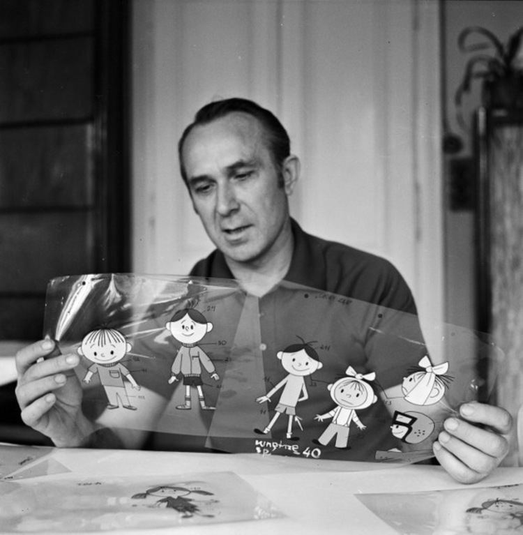 Władysław Nehrebecki holding his animator characters