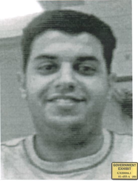 Waleed al-Shehri smiling while wearing a t-shirt