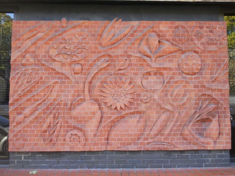 Walter Ritchie The Creation carved brick panels by Walter Ritchie on Bristol Eye