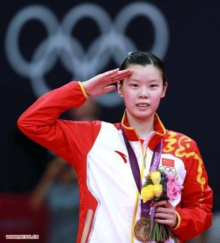 Wang Xin (badminton) Li Xuerui wins Olympic women39s badminton singles Wang Xin