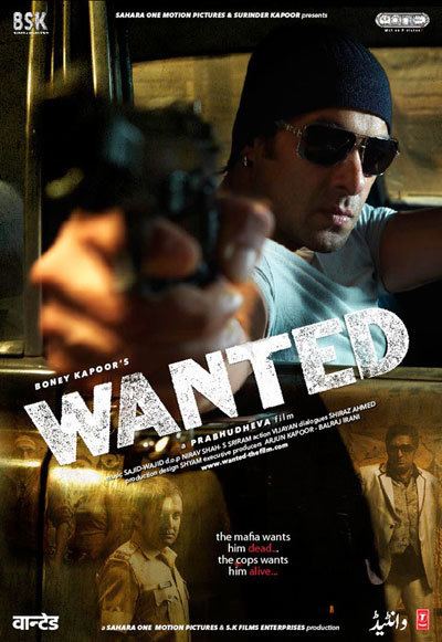 Salman Khan holding a gun while wearing black shades, black beanie and gray t-shirt in the movie poster of Wanted (2009 film)