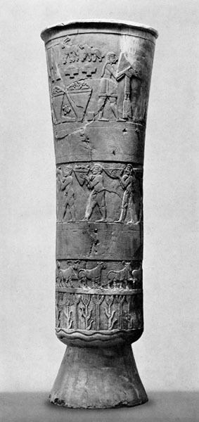 Warka Vases, a slim carved alabaster vessel.