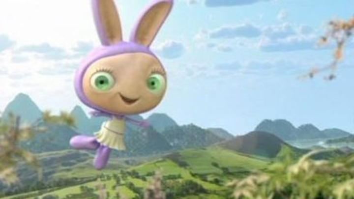 Lau Lau the purple rabbit smiling in a scene from the 2009 tv series Waybuloo