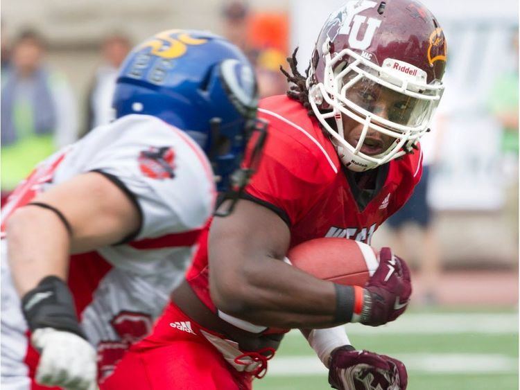 Wayne Moore (American football) Football was a way out for rookie Alouettes rusher Wayne Moore