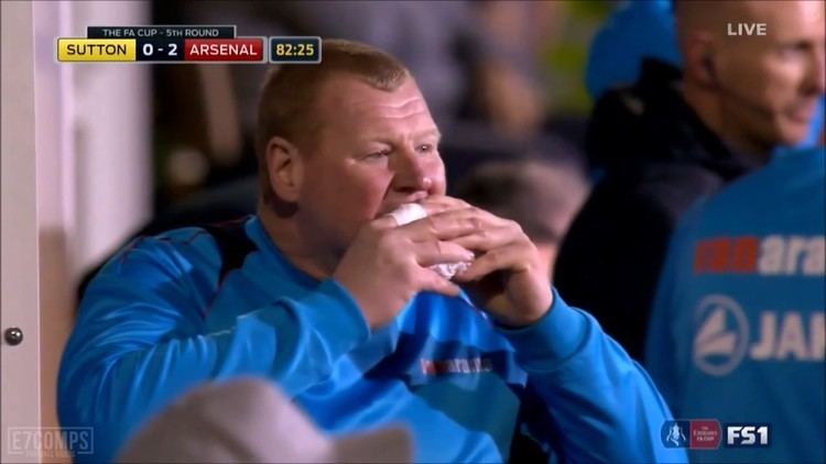 Wayne Shaw (safety) Suttons GK Wayne Shaw eating a pie on the sideline during the FA
