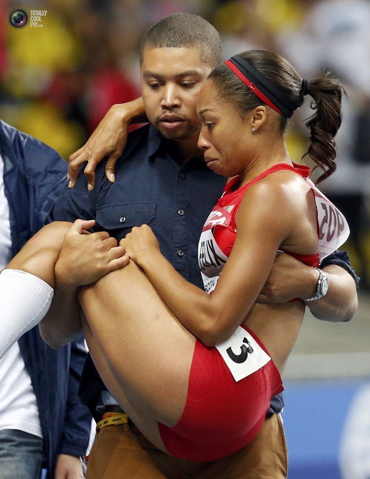 Wes Felix Felix of the US is carried off the track by her brother