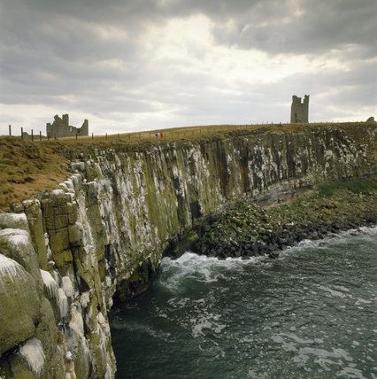 Whin Sill View of Whin Sill Cliff at Dunstanburgh Northumberland