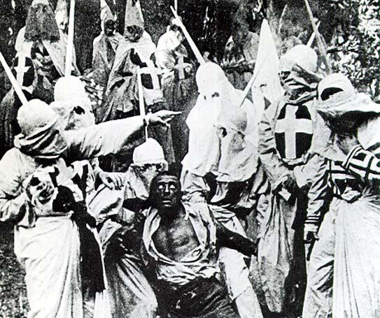 White and Black: Crimes of Color movie scenes A scene from the 1915 movie The Birth of a Nation showing African American character Gus played by white actor Walter Long in blackface about to be 