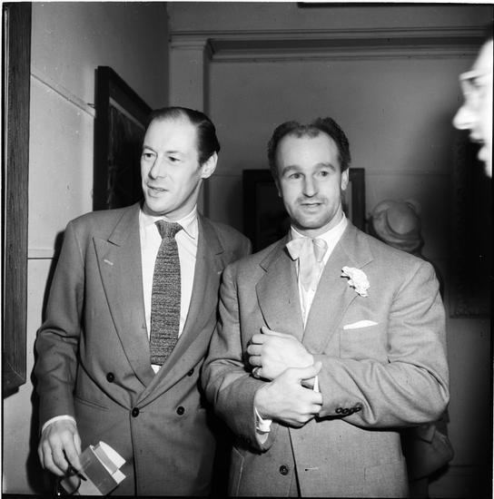 William Grant Sherry and the man beside him are wearing a coat, long sleeves, and necktie