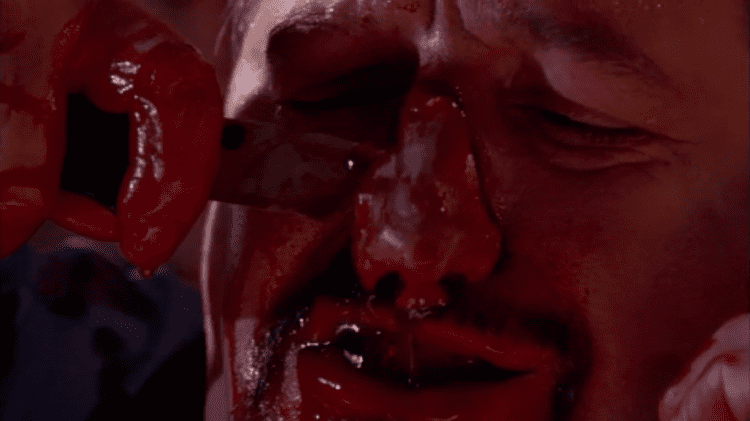 Wishmaster 4: The Prophecy Fulfilled movie scenes But there are some satisfyingly gross moments like the face peel scene typical of the franchise and some genie wish induced self mutilation 