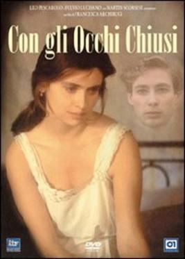 Debora Caprioglio wearing a white sleeveless dress in the movie poster of the 1994 film, With Closed Eyes