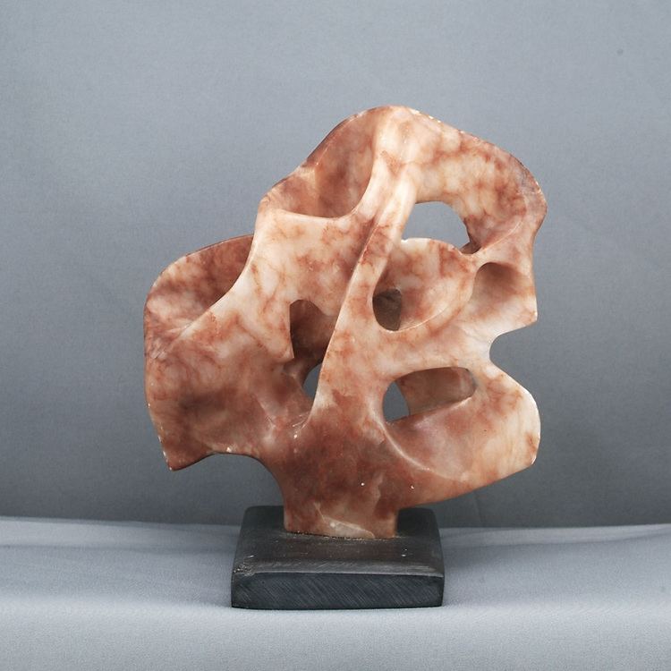Witold Gracjan Kawalec Witold Gracjan Kawalec carved alabaster sculpture representing luck