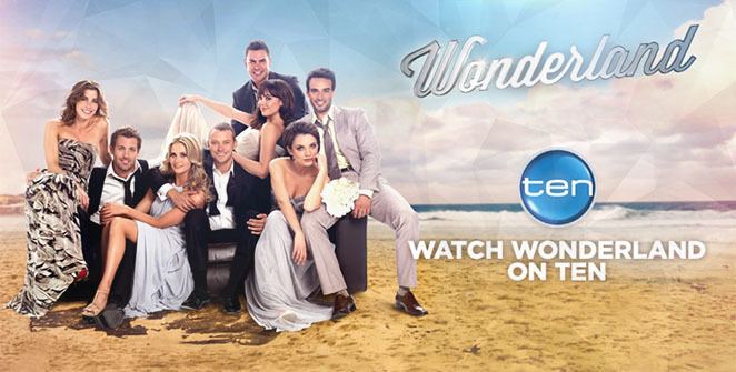 Poster of Wonderland, an Australian television romantic comedy-drama series starring Brooke Satchwell, Tim Ross, Anna Bamford, Michael Dorman, Emma Lung, Ben Mingay, Jessica Tovey, and Glenn McMillan sitting on a couch at the beach.