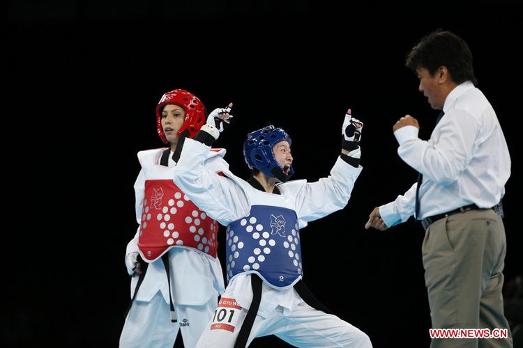 Wu Jingyu Wu Jingyu wins Olympic women39s taekwondo gold Chinaorgcn