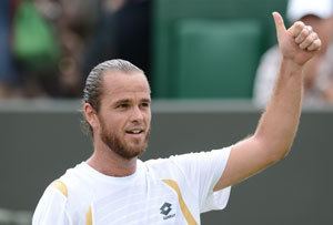 Xavier Malisse Xavier Malisse ousts David Ferrer in 1st round of Topshelf