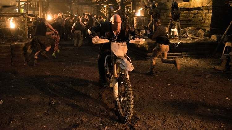 Vin Diesel riding in a motorcycle in a scene from the 2017 movie, XXX: Return of Xander Cage