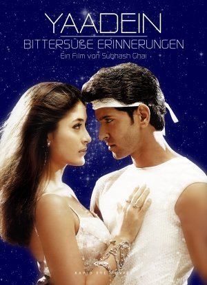 Hrithik Roshan and Kareena Kapoor staring at each other while wearing a white top in the 2001 film, Yaadein