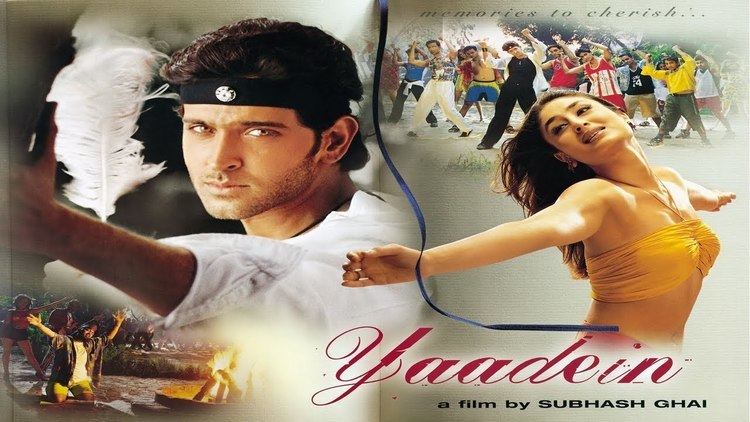 Hrithik Roshan wearing white long sleeves while Kareena Kapoor wearing a yellow top in a movie scene from the 2001 film, Yaadein