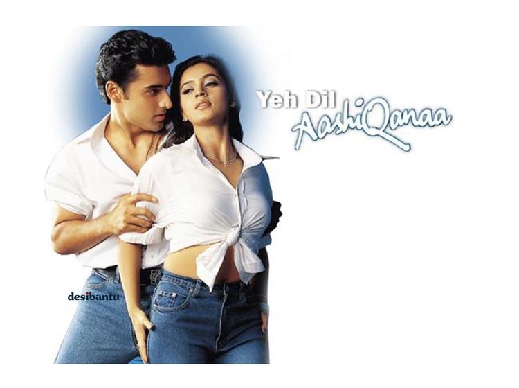 Karann Nathh looking at Jividha Sharma while holding her arms in the 2002 Indian romantic action film, Yeh Dil Aashiqanaa