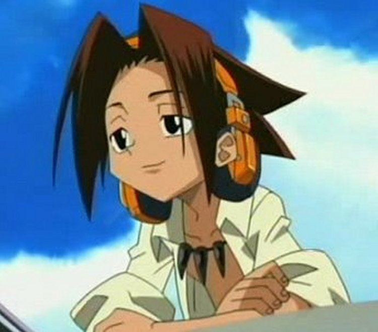 Yoh Asakura looking afar while wearing white long sleeves, necklace, and orange headset