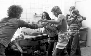 Children fighting in a scene from the 1978 film "You Are Not Alone"
