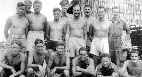 Des Foster (third from right standing) and his fellow Z' Special Unit operatives from Operation Semut in Borneo during 1945, wearing short pants and topless
