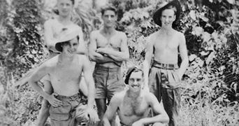 5 crews of Z Special Unit members, smiling together,  wearing pants and topless