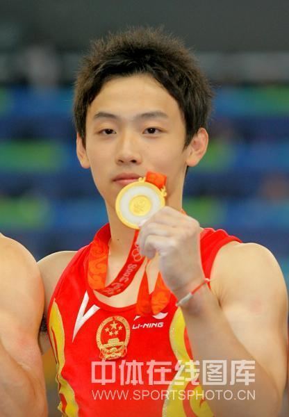 Zou Kai Gymnast Zou Kai to auction off Gold Medal for Sichuan Cfensi
