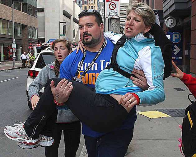 Joe Andruzzi Former Patriots player Joe Andruzzi carries survivor away